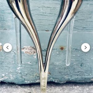 Metal champagne flute holder designed by Philippe Di Meo for Moët & Chandon